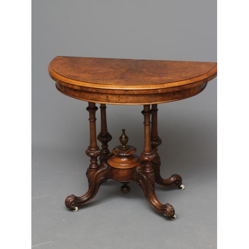 732 - A PAIR OF VICTORIAN BURR WALNUT FOLDING CARD TABLES, third quarter 19th century, of demi-lune form l... 