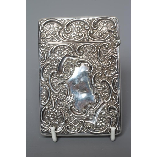 101 - AN EDWARDIAN SILVER VISITING CARD CASE by Crisford & Norris, Birmingham 1902, of plain oblong form w... 