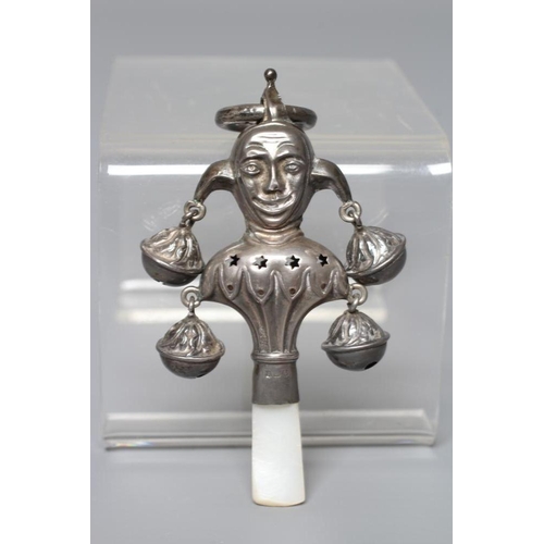 105 - A SILVER RATTLE/TEETHER by Wilmot Man. Co., Birmingham 1918, in the form of a jester with four bells... 