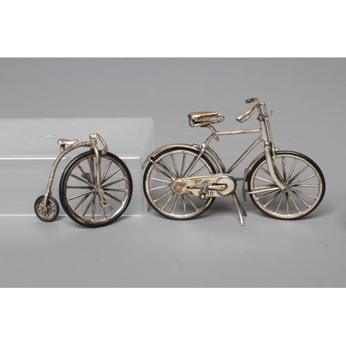 108 - A MODERN SILVER MINIATURE MODEL PENNYFARTHING, maker's mark SMC, London import mark, stamped 925, 1 ... 