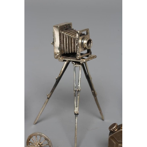 109 - A MODERN SILVER MINIATURE MODEL TRIPOD PLATE CAMERA, maker's mark SMC, London import mark, 3 1/2