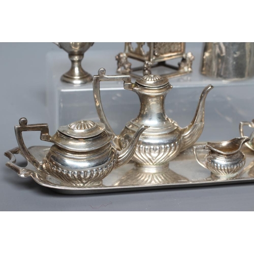 112 - A MINIATURE SILVER FIVE PIECE TEA AND COFFEE SERVICE by William Adams Ltd., Birmingham 1978, of semi... 