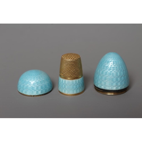 118 - A SILVER GILT THIMBLE IN MATCHING EGG CASE, 935 standard, both with duck egg blue guilloche enamelli... 