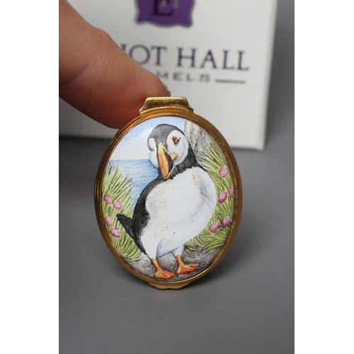 127 - THREE ELLIOT HALL ENAMEL BOXES comprising a cylindrical box painted by Marie Graves with Puffins, 2