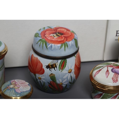 131 - AN ELLIOT HALL ENAMEL JAR AND COVER of baluster form painted by Sandra Selby with Poppies and Bees, ... 