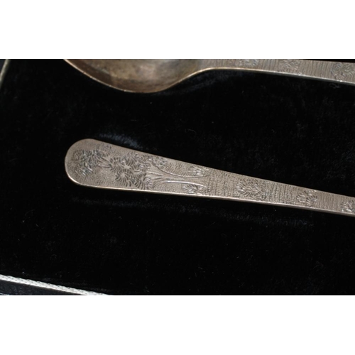 154 - AN EDWARDIAN SILVER CHRISTENING SPOON AND FORK by Jackson & Fullerton, London 1902/3, cast in the ro... 