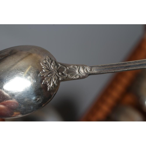 155 - A SET OF TWELVE FRENCH SILVER TEASPOONS, 950 standard, indistinct bigorne marks, with scroll cast fi... 