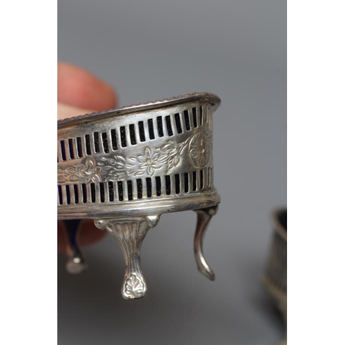 168 - A PAIR OF LATE VICTORIAN SILVER NAVETTE SALTS by Thomas Hayes, Birmingham 1898, with pierced arcadin... 