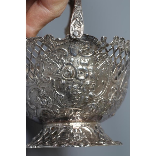 174 - A LATE VICTORIAN SILVER BASKET imported by William Moering, London 1894, with diaper and foliate cas... 