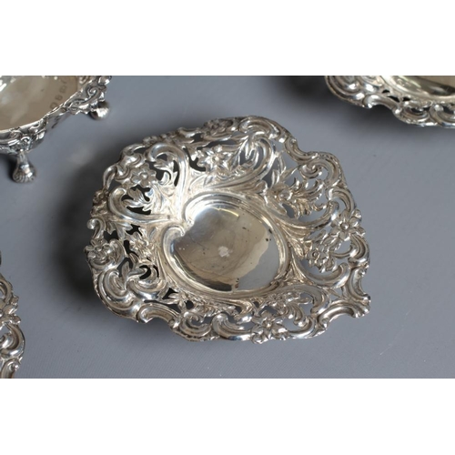 188 - A SET OF FOUR LATE VICTORIAN SILVER BON-BON DISHES by Deakin & Francis, Birmingham 1894, of rounded ... 