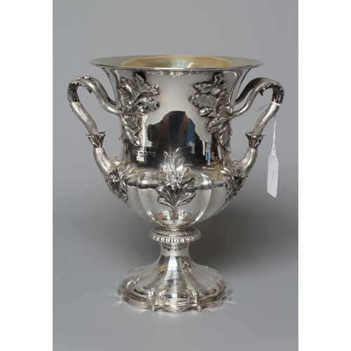 217 - A WILLIAM IV SILVER TWO HANDLED TROPHY CUP by The Barnards, London 1833, the bell bowl with lobed lo... 