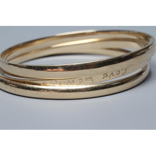 254 - TWO 9CT GOLD BANGLES, Sheffield 1997, sponsor DT, and London 2006, sponsor Lawson, Ward & Gammage, t... 