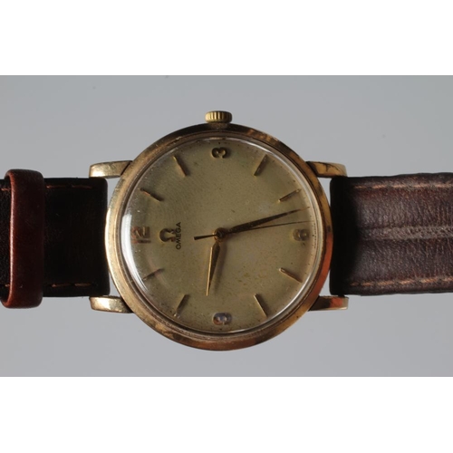 265 - A GENTLEMAN'S 9CT GOLD OMEGA WRISTWATCH, the champagne dial with applied gilt batons, quarter Arabic... 