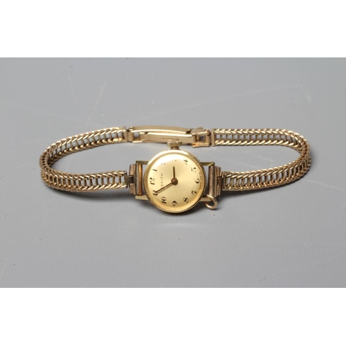 268 - A LADY'S 18CT GOLD CASED ZENITH WRISTWATCH, the gilt dial with black Roman numerals, unnumbered seve... 