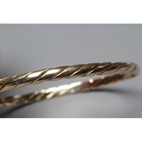 282 - A 9CT GOLD PLAIN TWIST BANGLE, Sheffield 1987, sponsor MJM, 14.7g