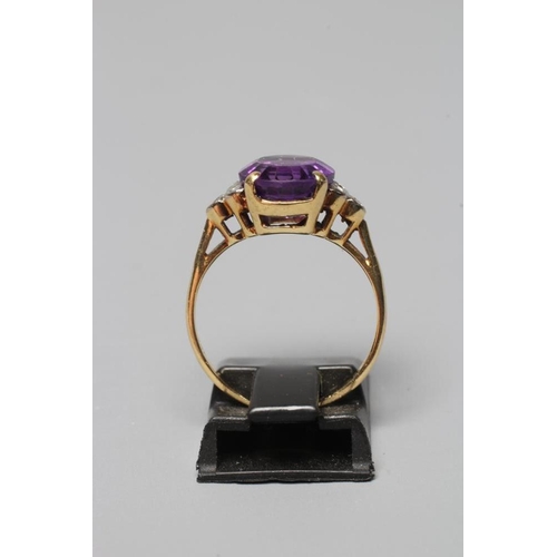 284 - AN AMETHYST AND DIAMOND DRESS RING, the facet cut oval amethyst claw set with three small round bril... 