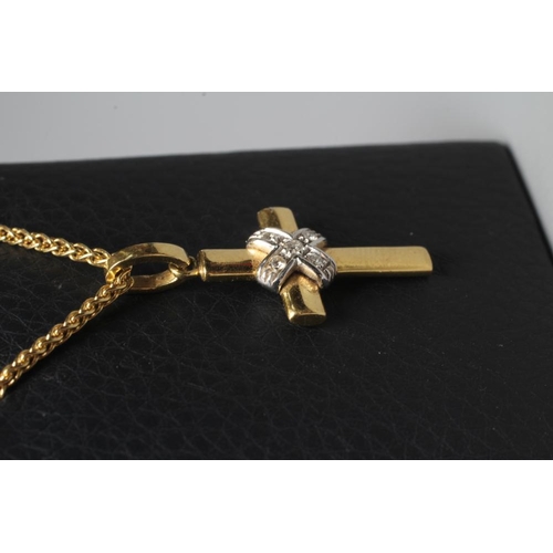 285 - AN 18CT GOLD AND DIAMOND CROSS PENDANT, the plain cross with five small round brilliants point set i... 