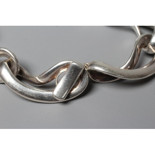 291 - A GEORG JENSEN SILVER INFINITY BRACELET designed by Regitze Overgaard, No. 452, London 2011, 74.8g (... 