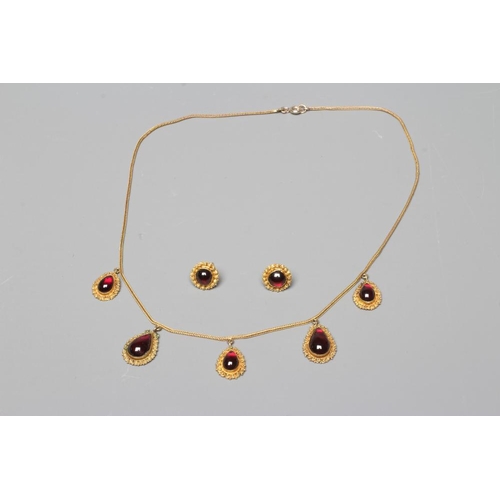 316 - A VICTORIAN GARNET NECKLACE, the five graduating tear shaped carbuncles close back set in the classi... 