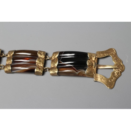 317 - A VICTORIAN SCOTTISH POLISHED AGATE BRACELET, the five ribbed panels with engraved gilt metal mounts... 