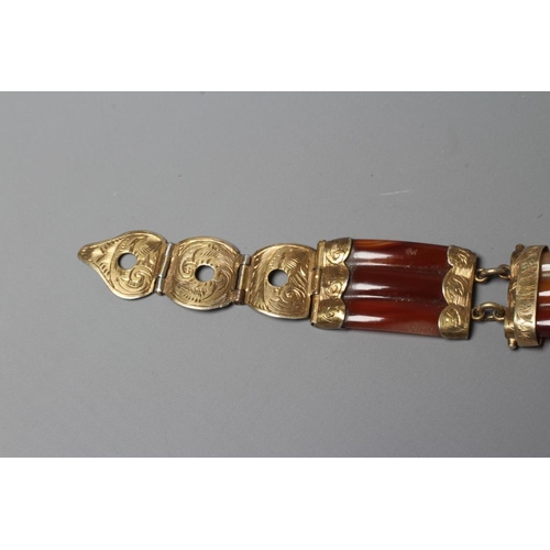 317 - A VICTORIAN SCOTTISH POLISHED AGATE BRACELET, the five ribbed panels with engraved gilt metal mounts... 