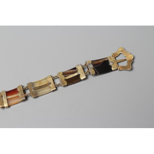 317 - A VICTORIAN SCOTTISH POLISHED AGATE BRACELET, the five ribbed panels with engraved gilt metal mounts... 