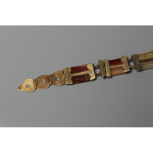 317 - A VICTORIAN SCOTTISH POLISHED AGATE BRACELET, the five ribbed panels with engraved gilt metal mounts... 