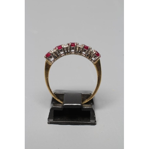 325 - A RUBY AND DIAMOND HALF HOOP RING, the five facet cut rubies interspersed with four pairs of small b... 