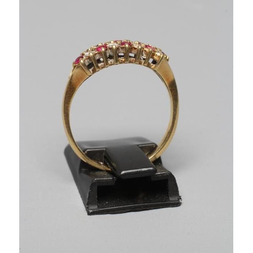 336 - A RUBY AND DIAMOND HALF HOOP ETERNITY RING, the four pairs of claw set small brilliant cut diamonds ... 