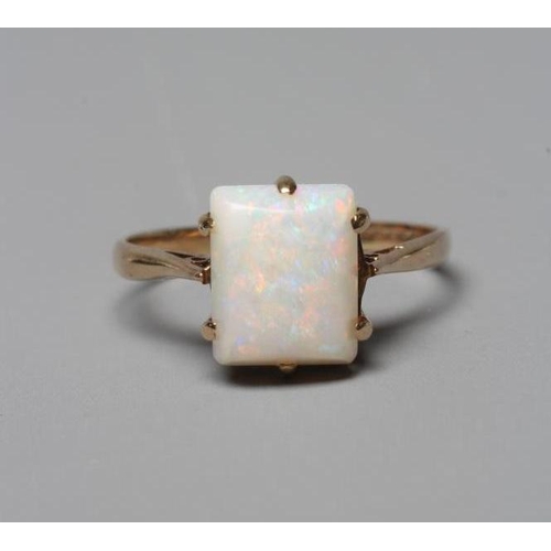 361 - AN OPAL DRESS RING, the square cut cabochon stone claw set to a plain 9ct gold shank, Birmingham pos... 