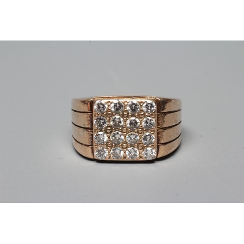 376 - A GENTLEMAN'S DIAMOND SIGNET RING, the sixteen brilliant cut stones grain set to a square plaque wit... 