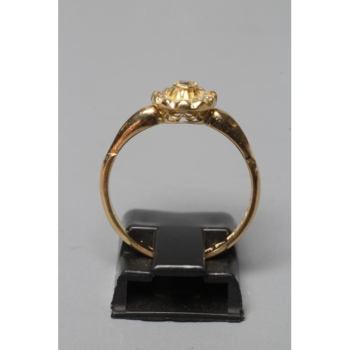 385 - AN EDWARDIAN DIAMOND CLUSTER RING, the ten mix cut stones in rub over setting to a plain 18ct gold s... 