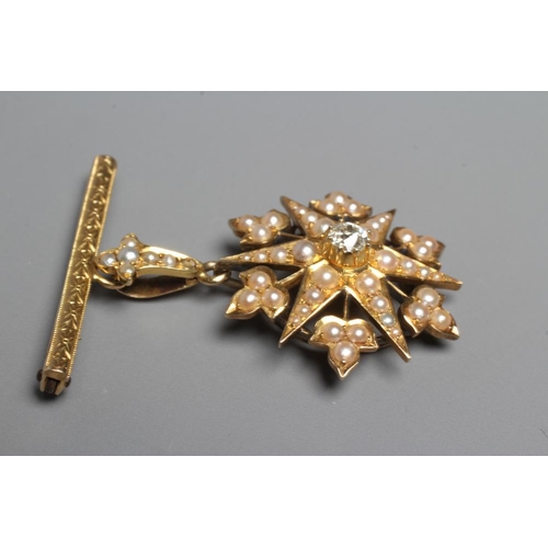 398 - A DIAMOND AND SEED PEARL STAR PENDANT, the central old brilliant cut stone of approximately 0.30cts,... 