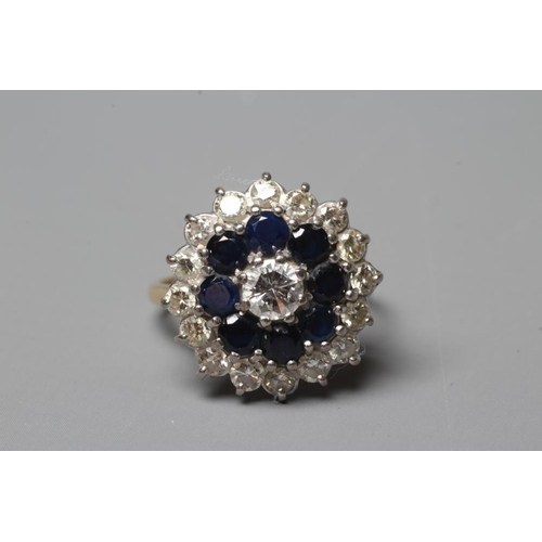 399 - A SAPPHIRE AND DIAMOND CLUSTER RING, the central brilliant cut diamond of approximately 0.40cts, cla... 