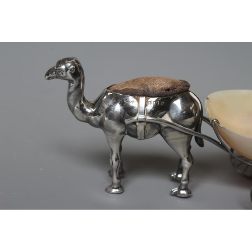 91 - A NOVELTY SILVER PIN CUSHION by Adie & Lovekin Ltd., Birmingham 1922, modelled as a camel harnessed ... 