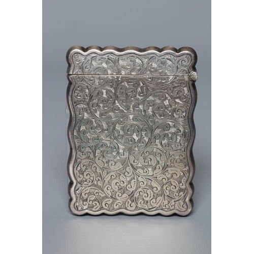 98 - A LATE VICTORIAN SILVER VISITING CARD CASE by William M. Hayes, Birmingham 1897, of shaped oblong fo... 