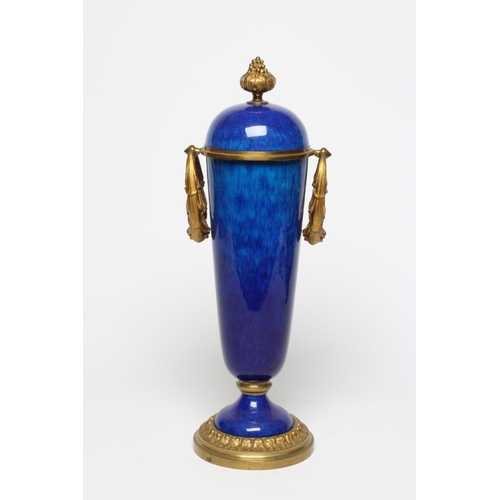 440 - A FRENCH NEOCLASSIC STYLE GARNITURE VASE, 20th century, the blue ceramic tapering body with ormolu m... 