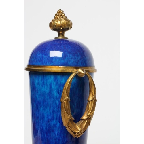 440 - A FRENCH NEOCLASSIC STYLE GARNITURE VASE, 20th century, the blue ceramic tapering body with ormolu m... 