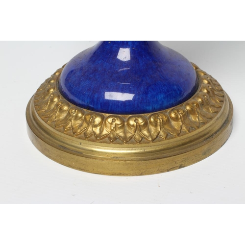 440 - A FRENCH NEOCLASSIC STYLE GARNITURE VASE, 20th century, the blue ceramic tapering body with ormolu m... 