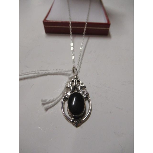 189 - SILVER AND BLACK ENAMEL PENDANT ON SILVER CHAIN