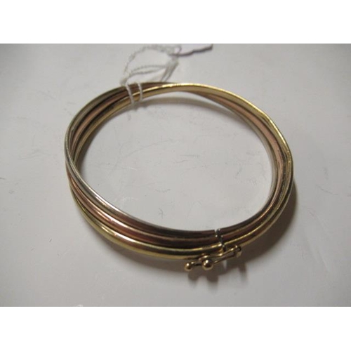 208 - 9CT GOLD TRI COLOUR STIFF HINGED TWIST BANGLE 9g