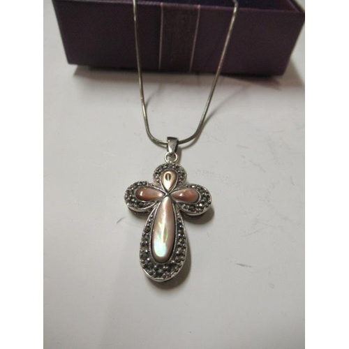 212 - SILVER AND MOTHER OF PEARL CROSS PENDANT ON SILVER CHAIN