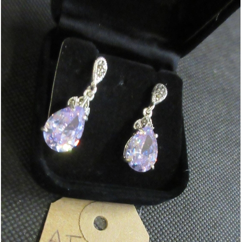 219 - PAIR OF LAVENDER STONE AND MARCASITE SILVER EARRINGS