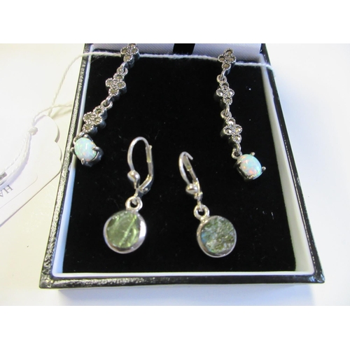 240 - TWO PAIRS OF SILVER DROP EARRINGS