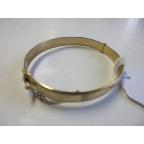 247 - 9CT GOLD BANGLE 22.4g