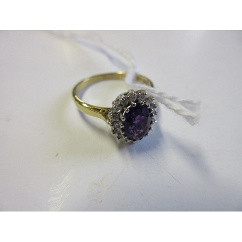 249 - AMETHYST AND DIAMOND CLUSTER 18CT GOLD RING 3.5g GROSS