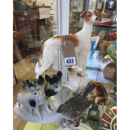 432 - THREE DOG ORNAMENTS AND A BESWICK WHITE THROATED BIRD