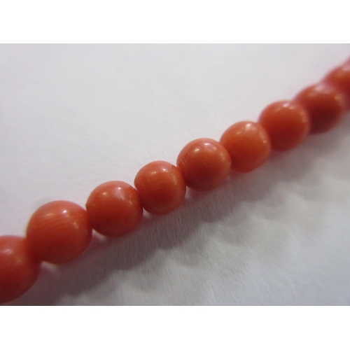 277 - CORAL BEAD NECKLACE WITH 9CT GOLD FASTENER