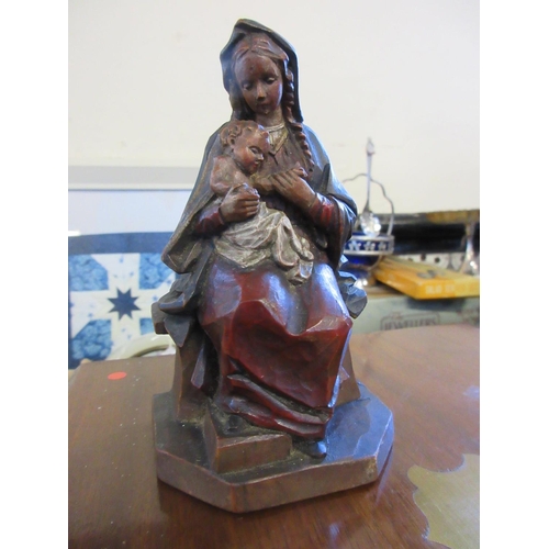 302 - THREE CARVED FIGURES INCLUDING MADONNA AND CHILD