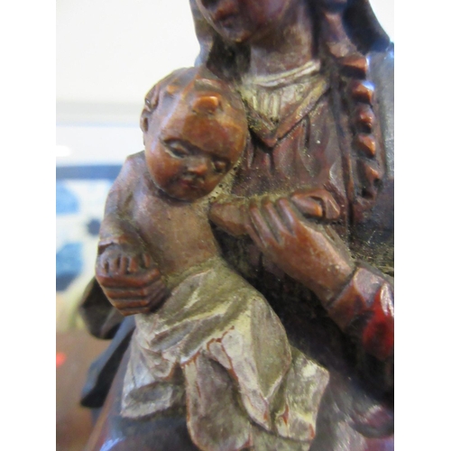 302 - THREE CARVED FIGURES INCLUDING MADONNA AND CHILD